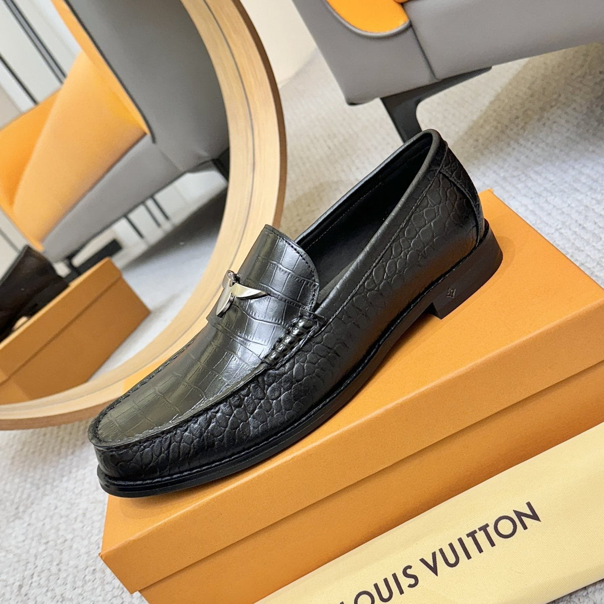 Louis Vuitton Men's Black Embossed Leather Loafers